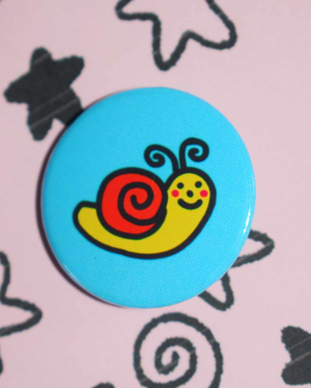 Simon the snail button badge