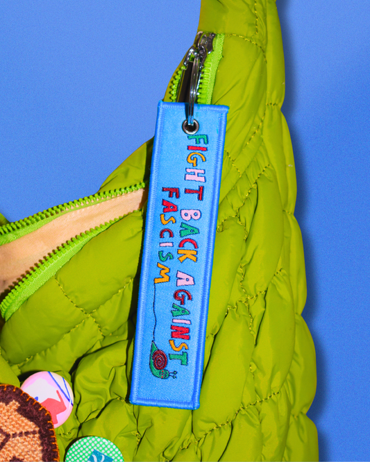 MOVING ON - Fight back against fascism - embroidered keyring / bag charm